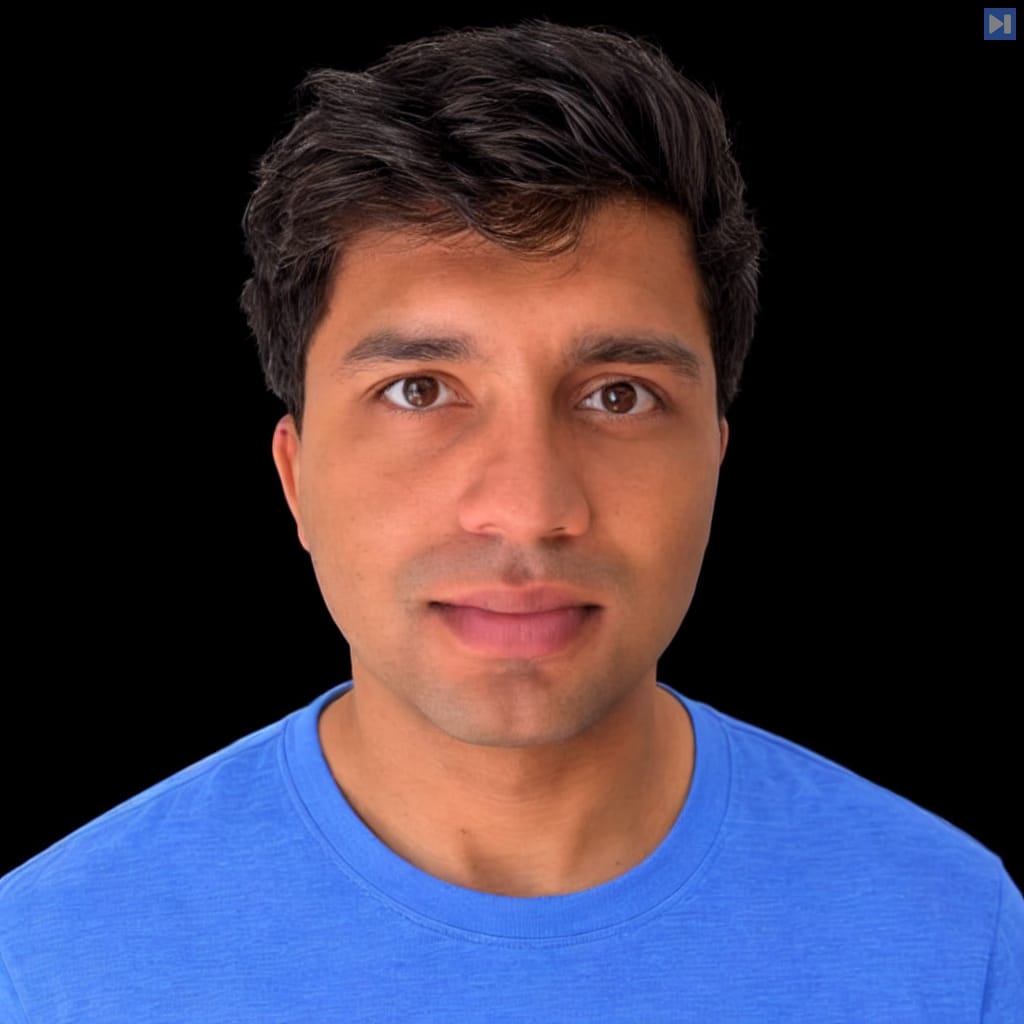 Head-and-shoulders portrait of Aamir Shakir against a black background.