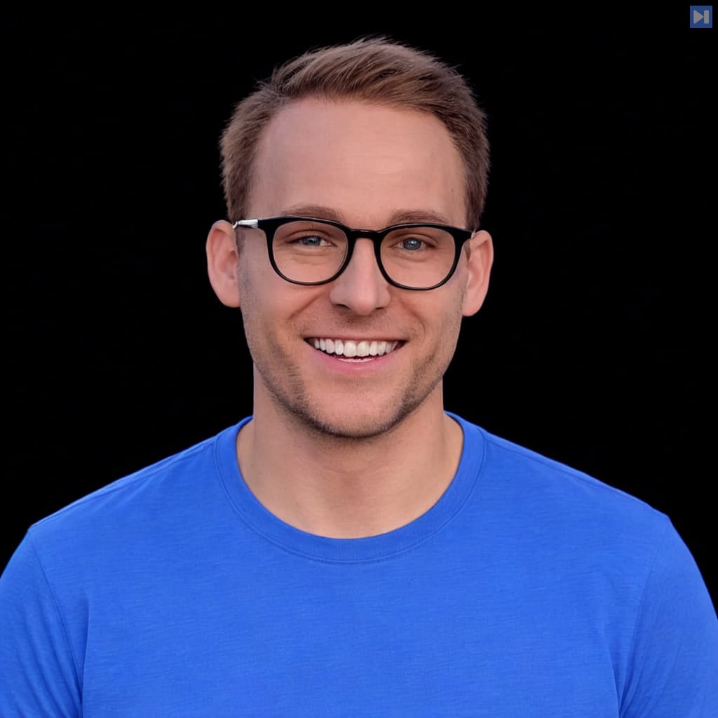 Head-and-shoulders portrait of Aaron Francis against a black background.