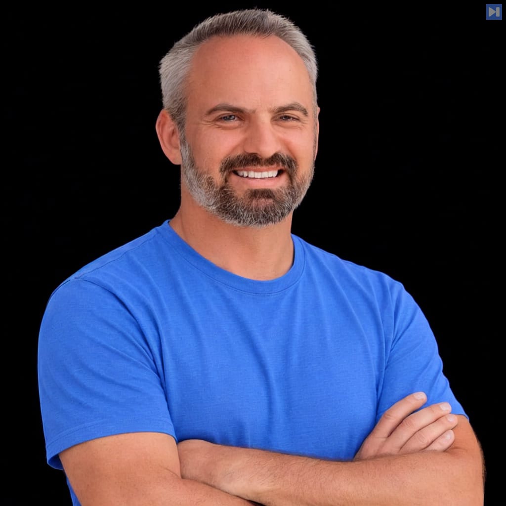 Head-and-shoulders portrait of Aaron Linsky against a black background.