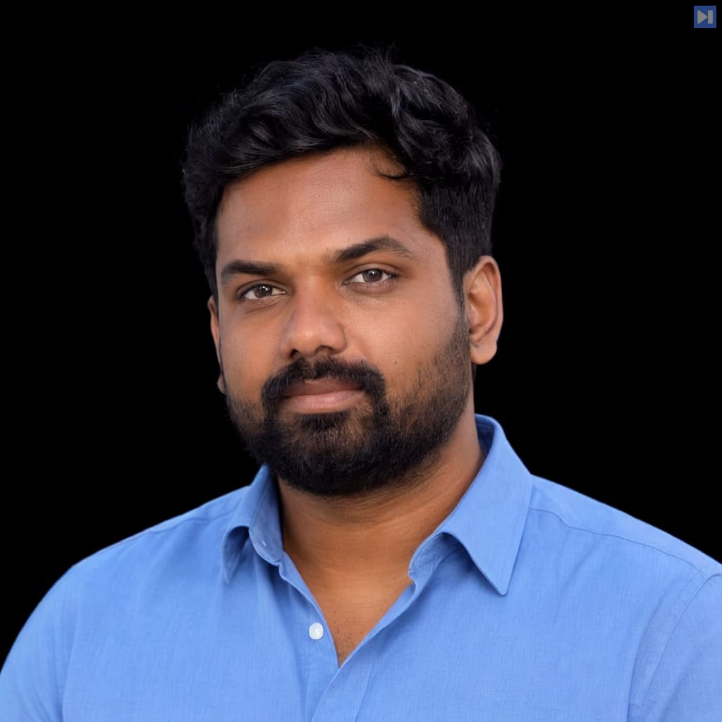 Head-and-shoulders portrait of Abhilash Asokan against a black background.