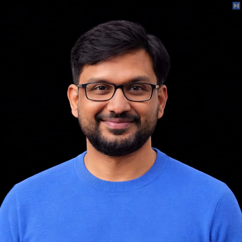 Head-and-shoulders portrait of Aditya Gautam against a black background.