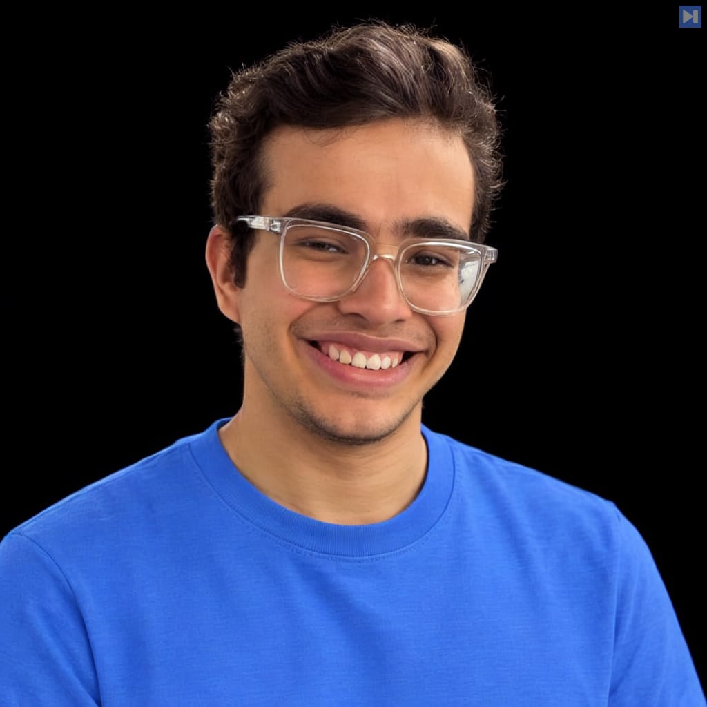 Head-and-shoulders portrait of Ahmed Ibrahim against a black background.