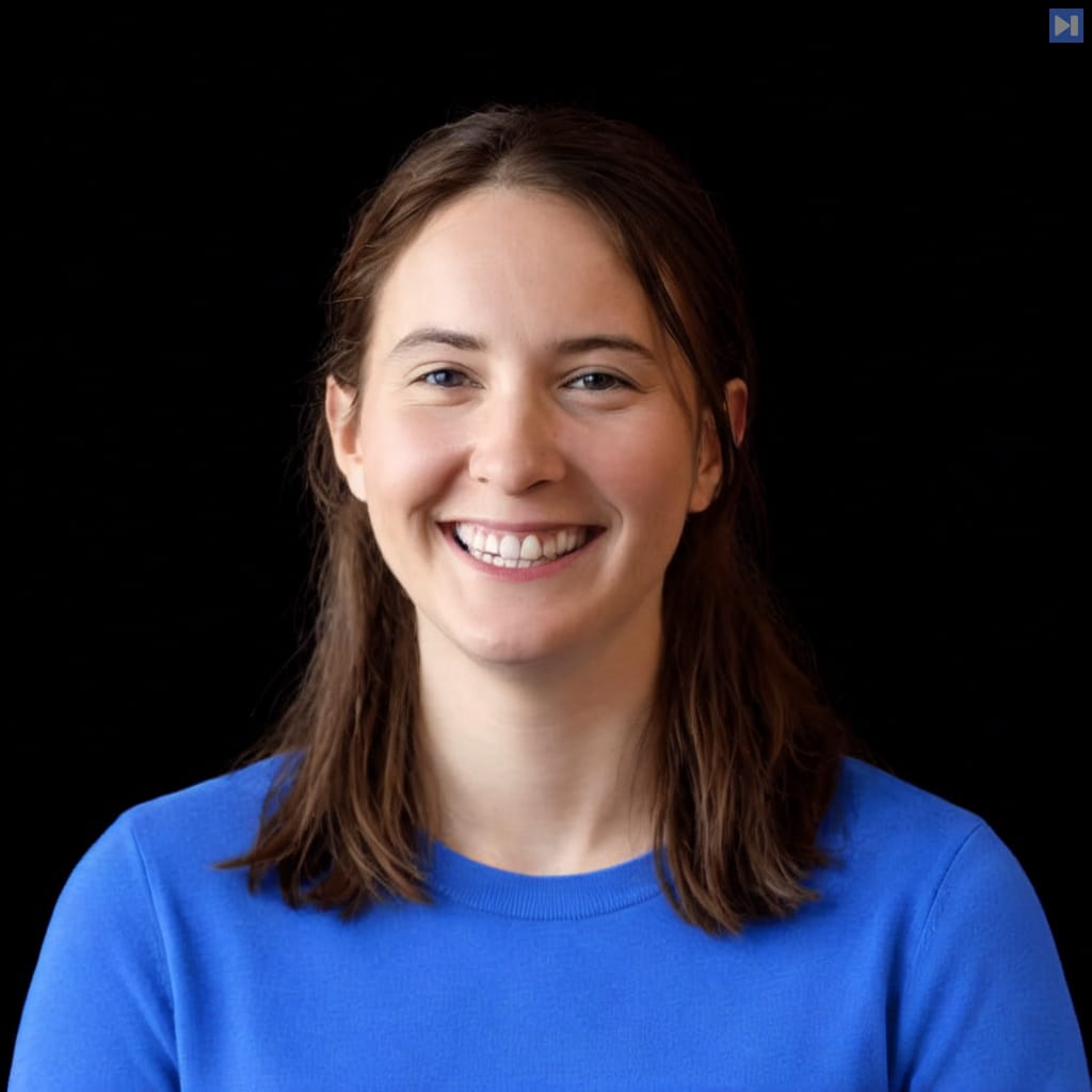 Head-and-shoulders portrait of Akele Reed against a black background.