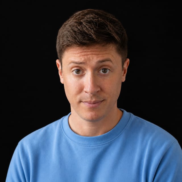 AI-generated portrait of Alex Finn wearing an AI Videos-blue top against a black background.
