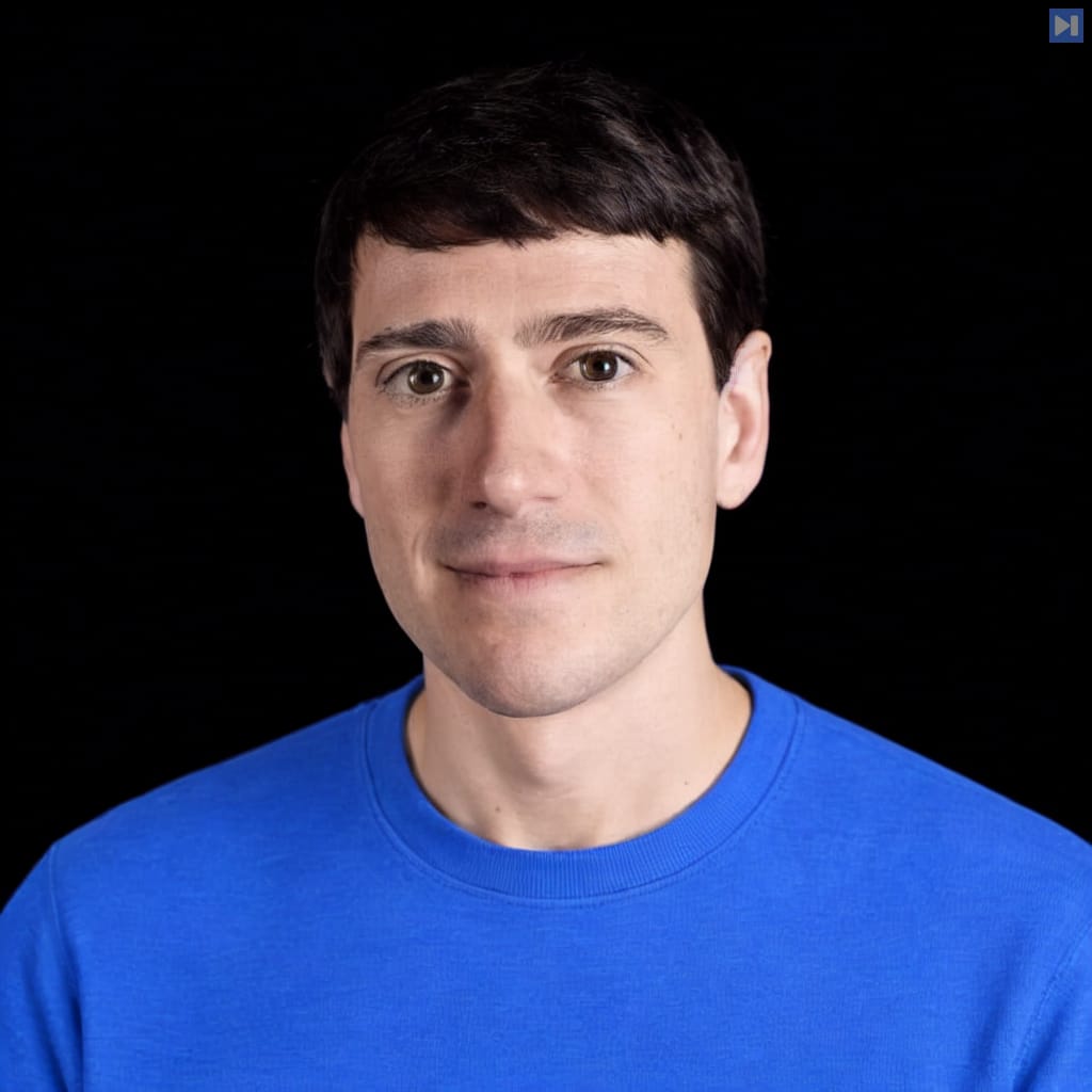 Head-and-shoulders portrait of Alex Gladstein against a black background.
