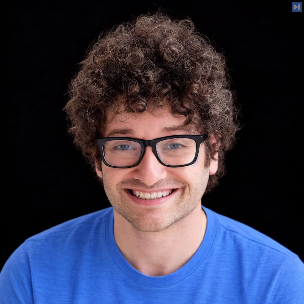 Head-and-shoulders portrait of Alex Imas against a black background.