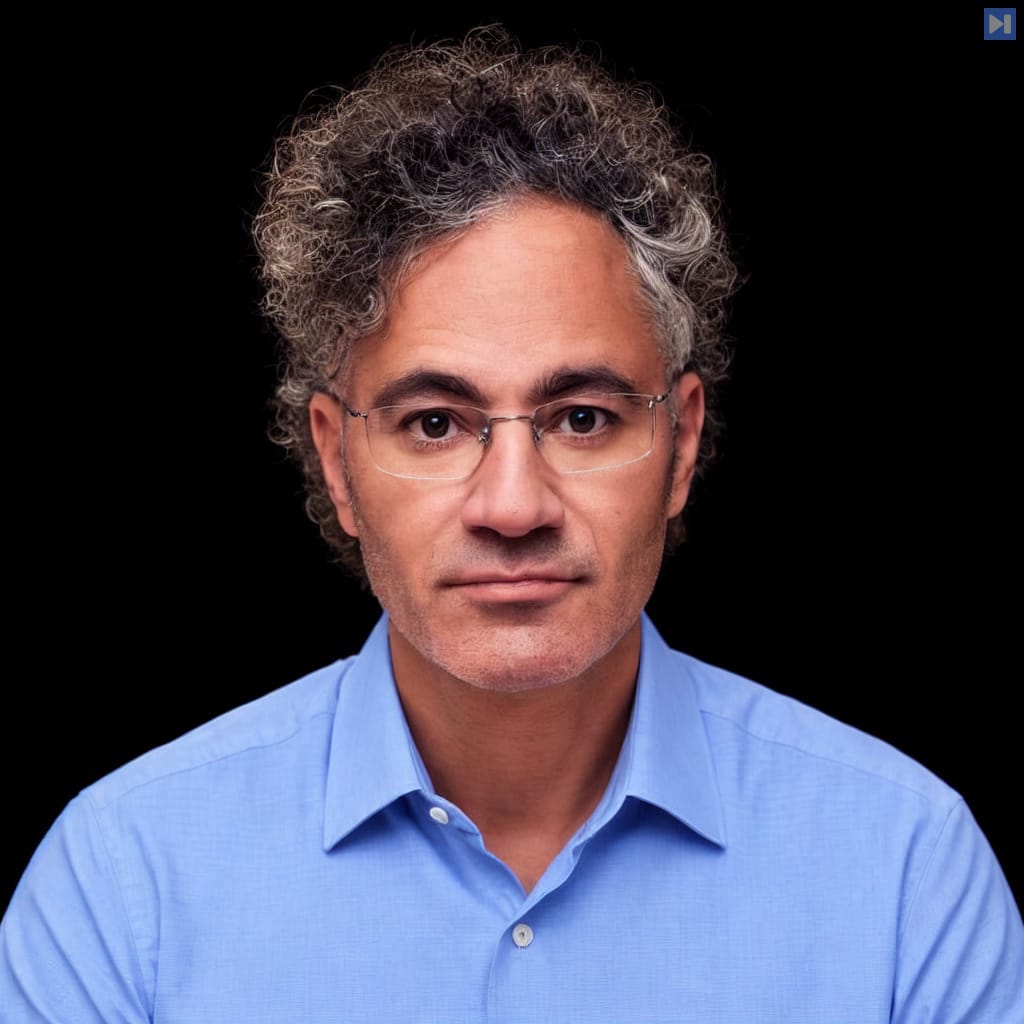 Head-and-shoulders portrait of Alex Karp against a black background.
