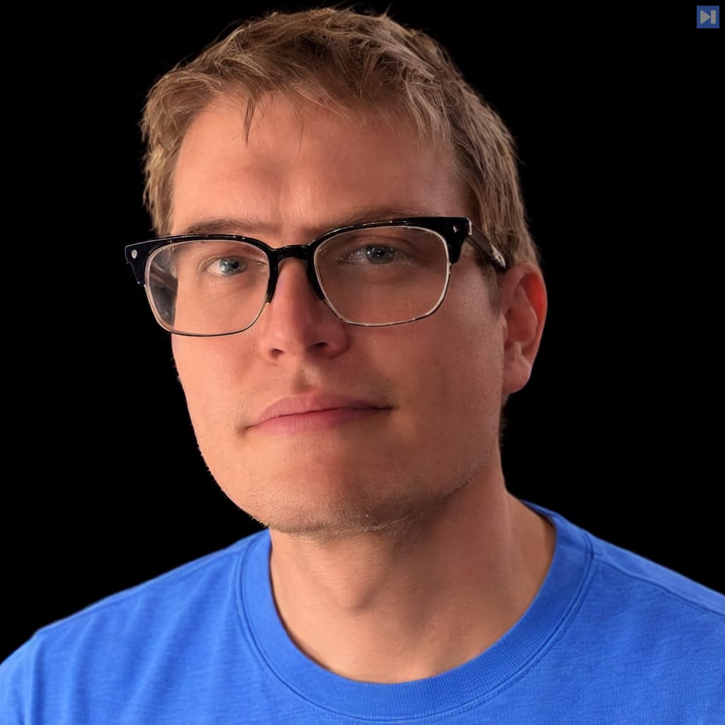 Head-and-shoulders portrait of Andrew Kelley against a black background.