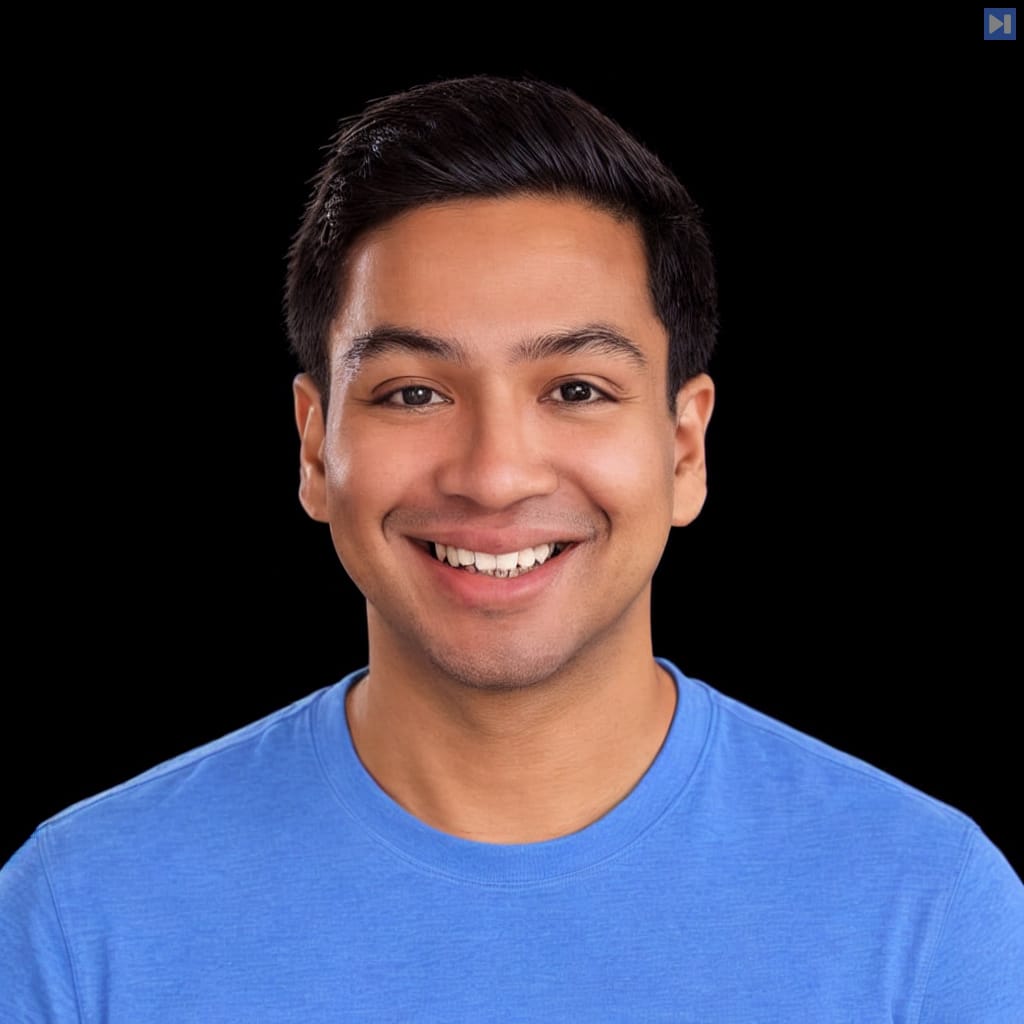 Head-and-shoulders portrait of Anirudha Majumdar against a black background.