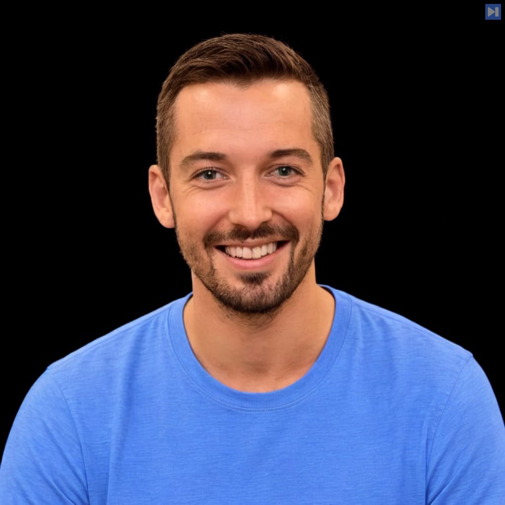 Head-and-shoulders portrait of Ant Wilson against a black background.