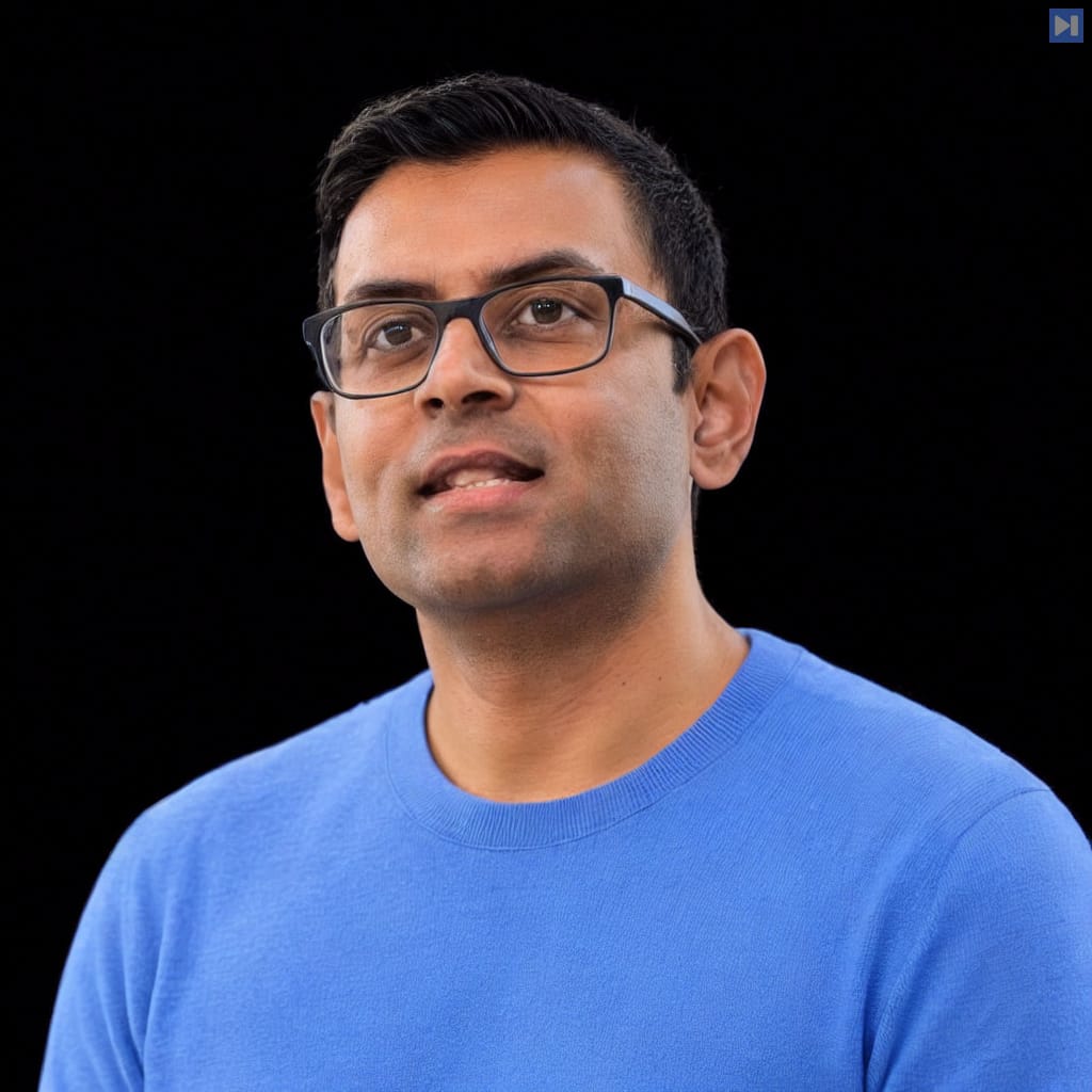 Head-and-shoulders portrait of Arvind Narayanan against a black background.