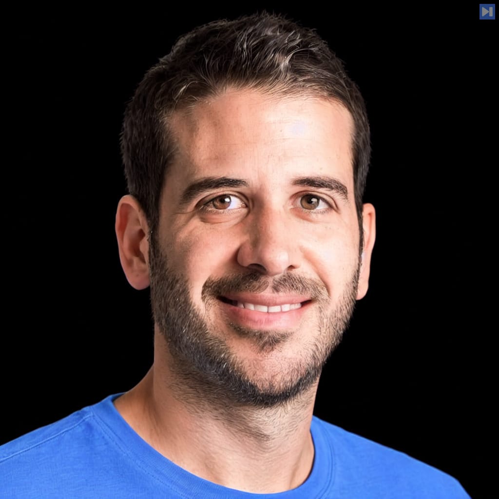 Head-and-shoulders portrait of Assaf Elovic against a black background.