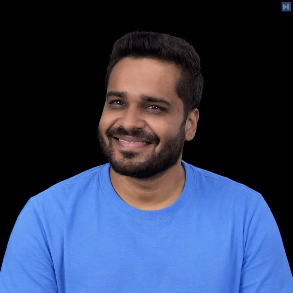 Head-and-shoulders portrait of Balakrishnan Ramdoss against a black background.