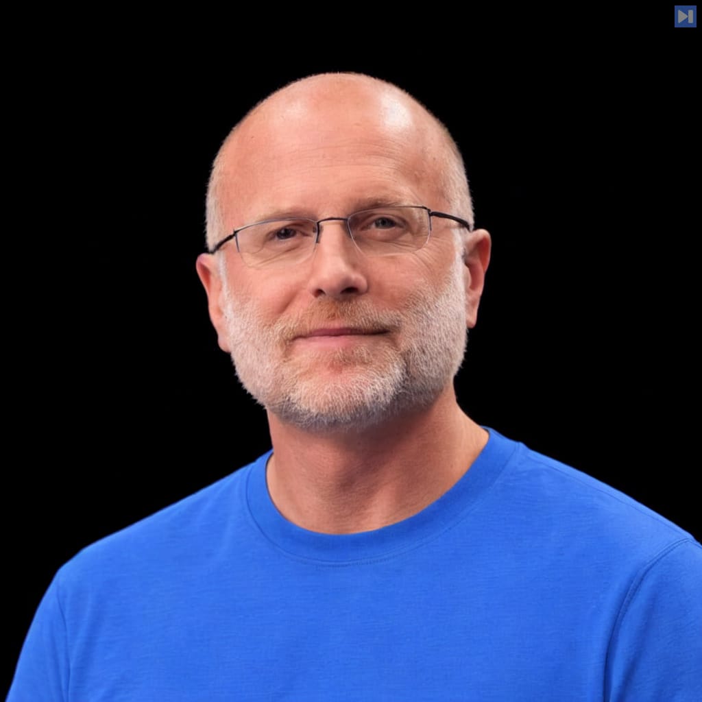 Head-and-shoulders portrait of Brendan Carr against a black background.