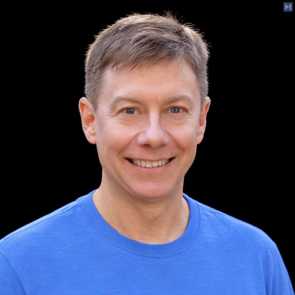 Head-and-shoulders portrait of Chad Jones against a black background.