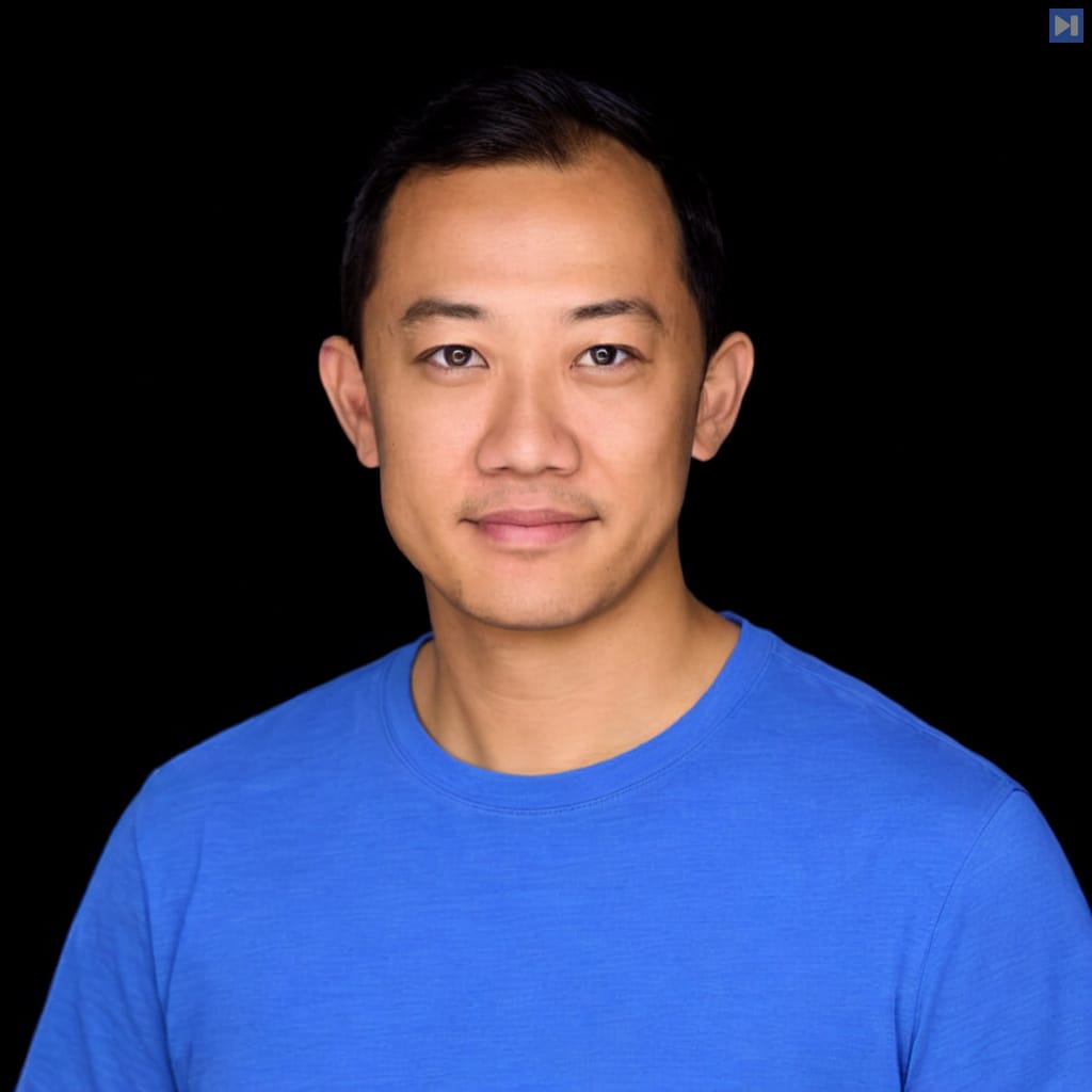 Head-and-shoulders portrait of Charlie Guo against a black background.