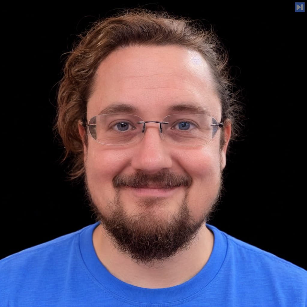 Head-and-shoulders portrait of Chris Noring against a black background.