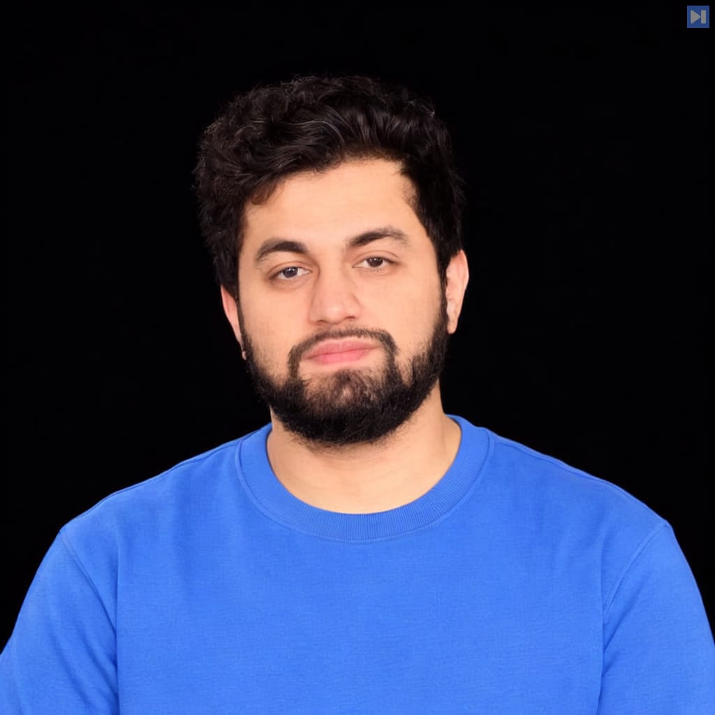 Head-and-shoulders portrait of Dhruv Nathawani against a black background.