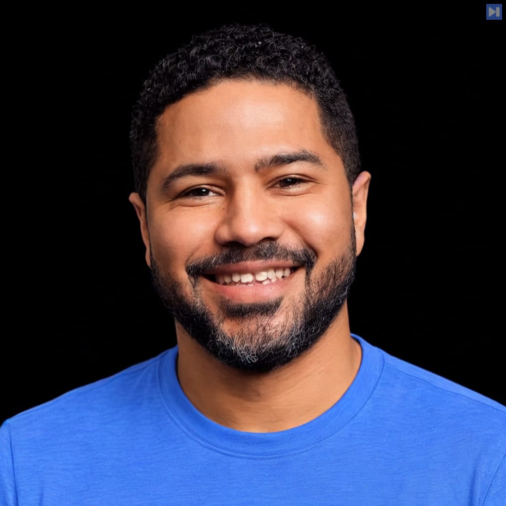 Head-and-shoulders portrait of Doneyli De Jesus against a black background.