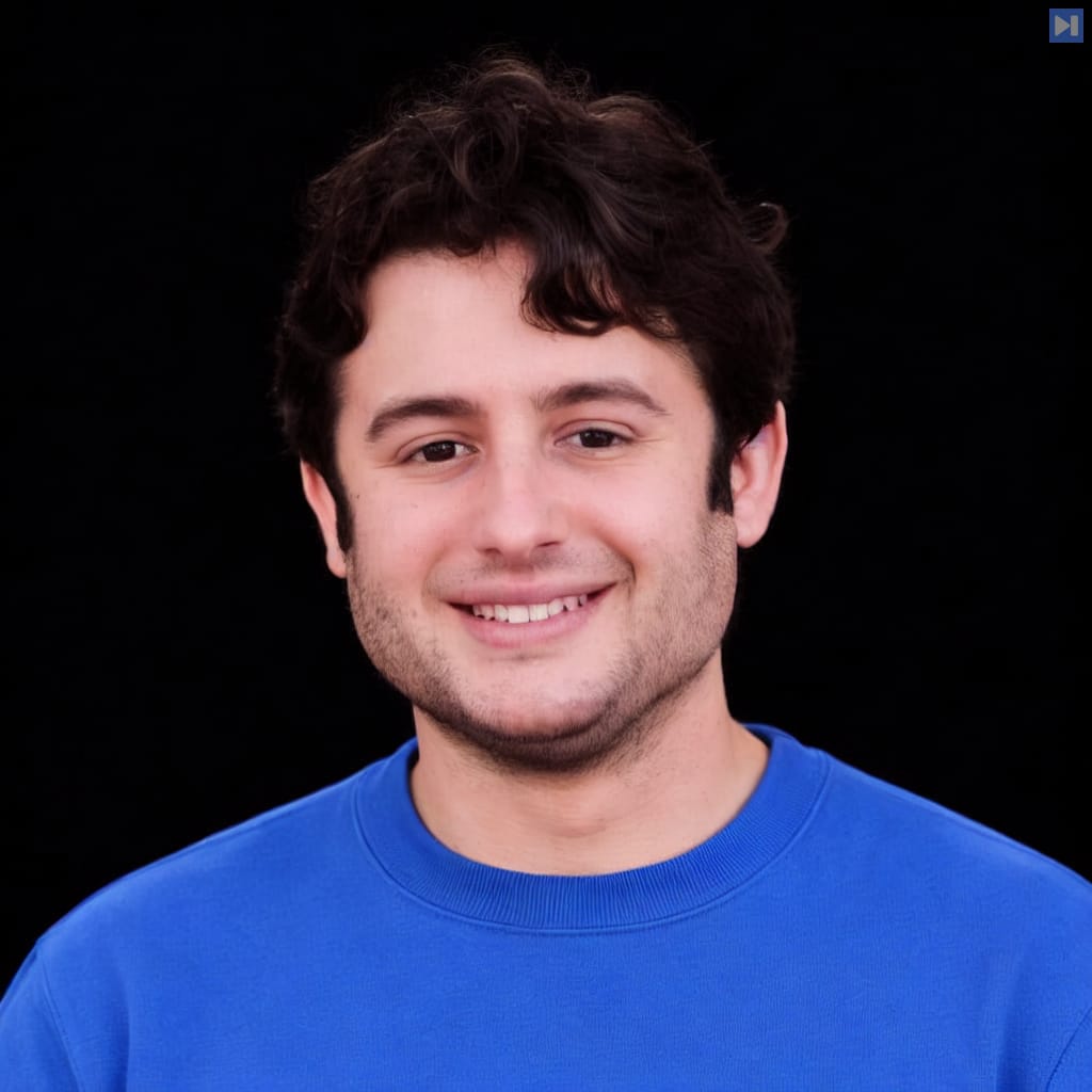 Head-and-shoulders portrait of Dylan Field against a black background.