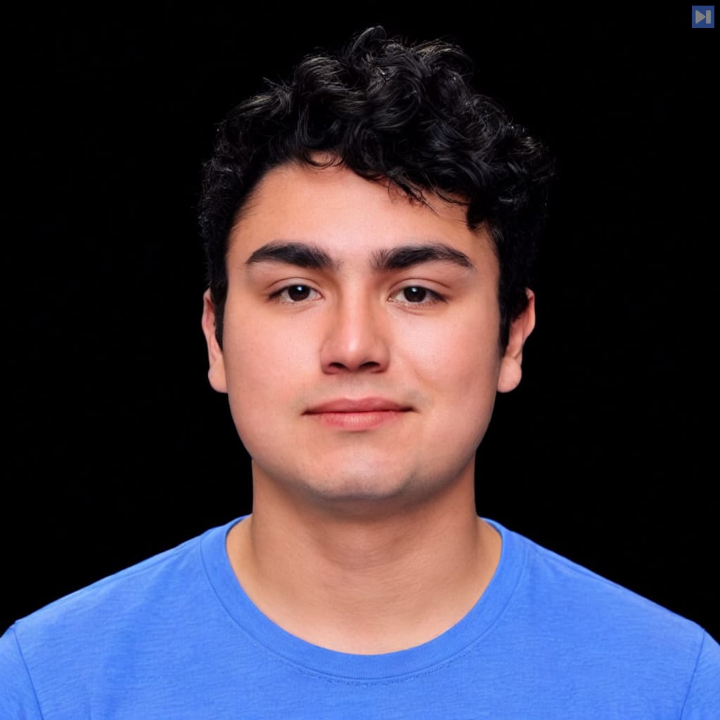 Head-and-shoulders portrait of Eno Reyes against a black background.