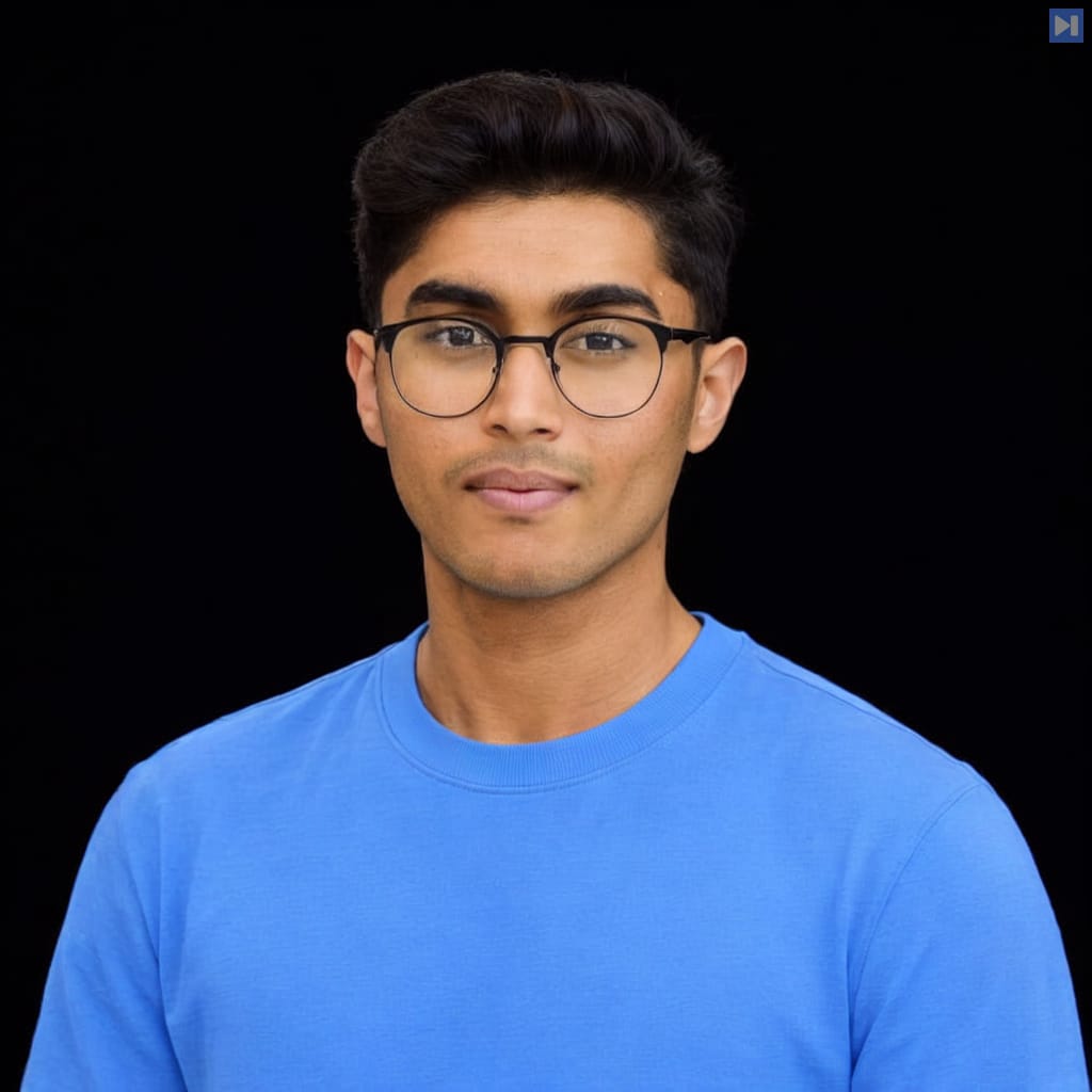 Head-and-shoulders portrait of Fuad Ali against a black background.
