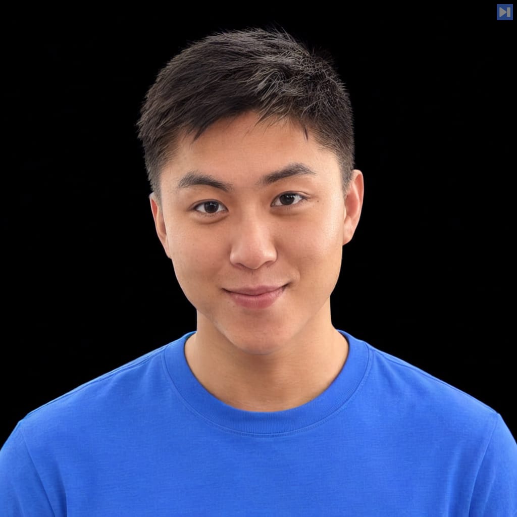 Head-and-shoulders portrait of George He against a black background.