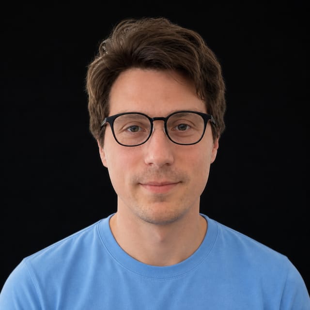AI-generated portrait of Igor Babuschkin wearing an AI Videos-blue top against a black background.