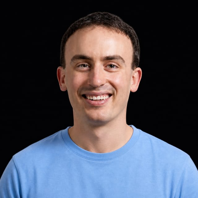AI-generated portrait of Jacob Effron wearing an AI Videos-blue top against a black background.