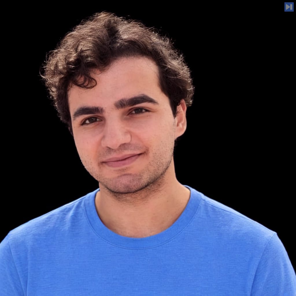 Head-and-shoulders portrait of Jarred Sumner against a black background.