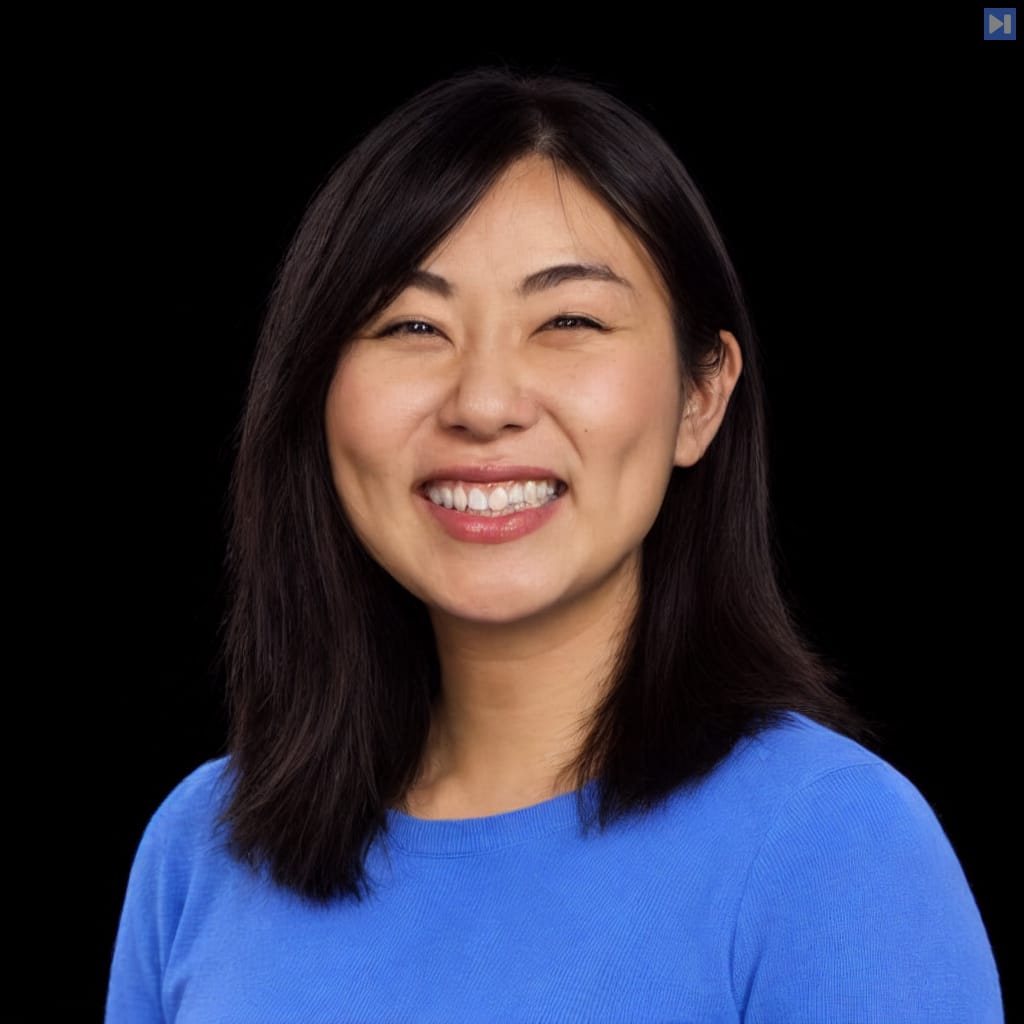Head-and-shoulders portrait of Jasmine Wang against a black background.