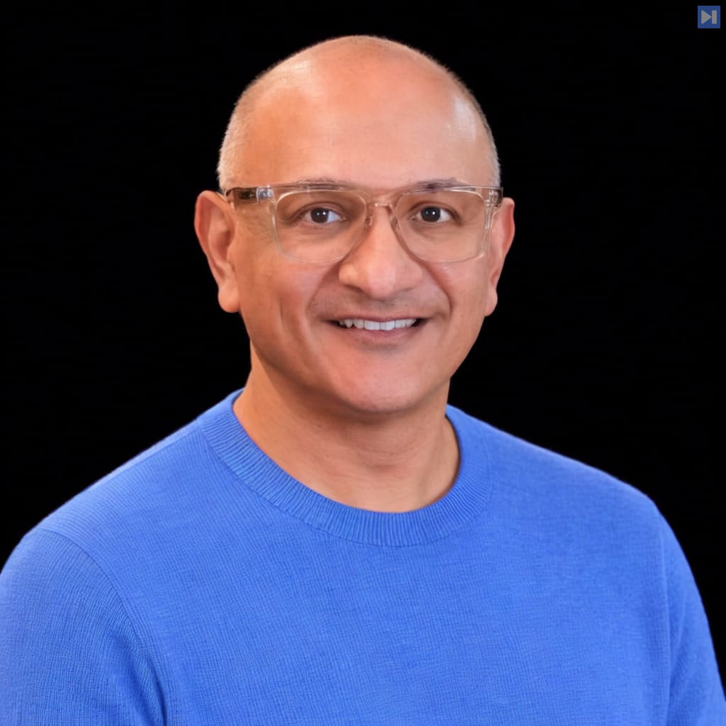 Head-and-shoulders portrait of Jeetu Patel against a black background.