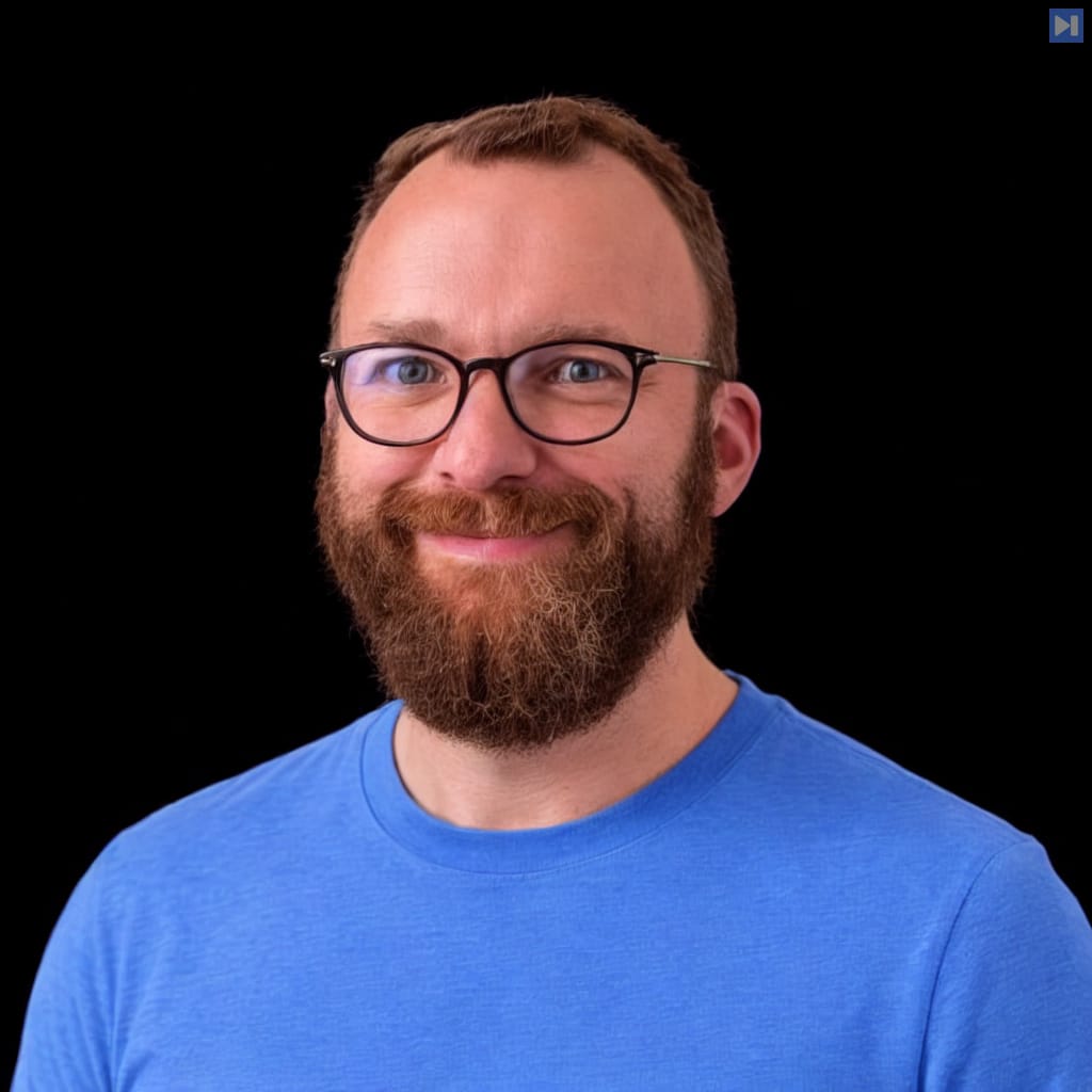 Head-and-shoulders portrait of Jeff Vestal against a black background.