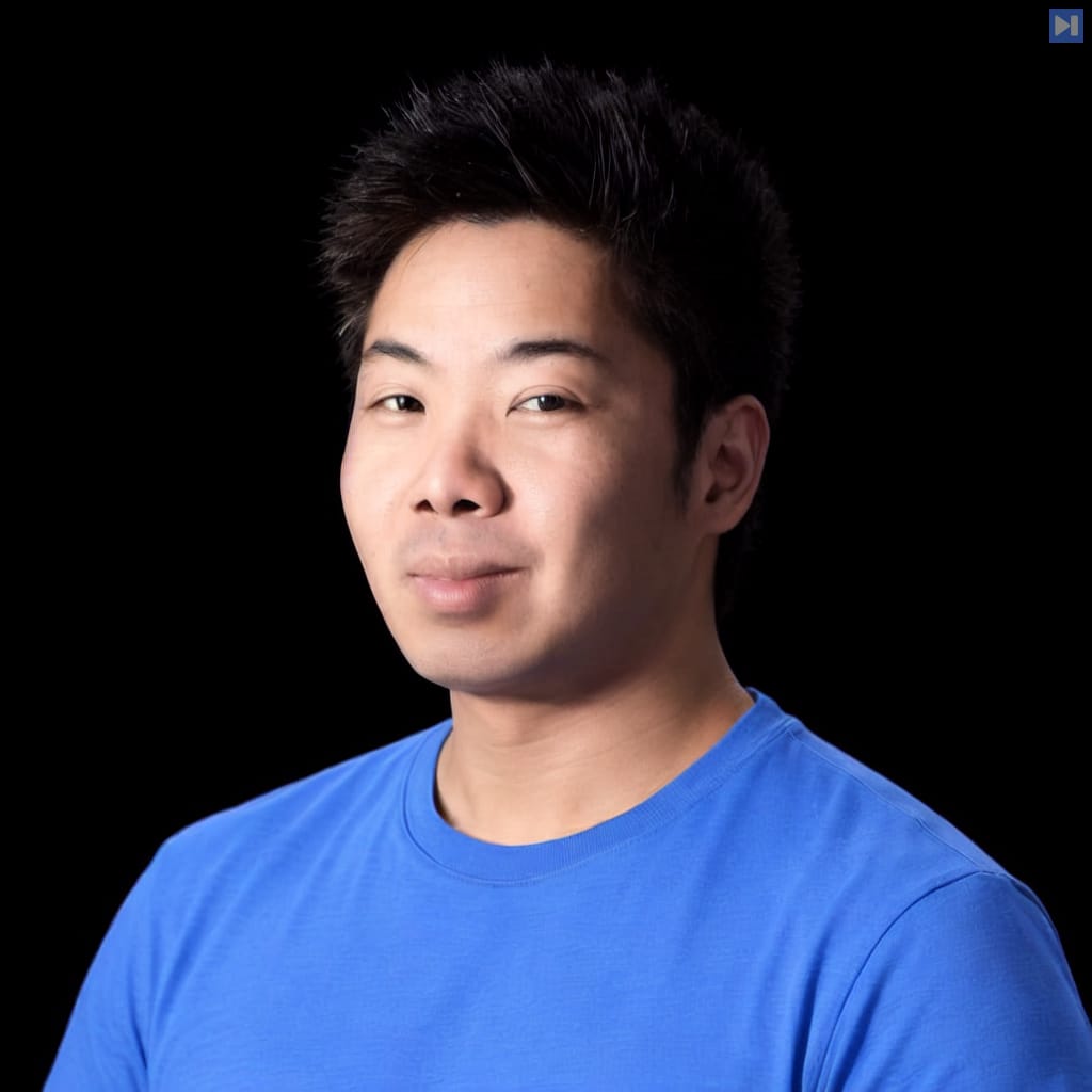 Head-and-shoulders portrait of Jeffrey Lee-Chan against a black background.