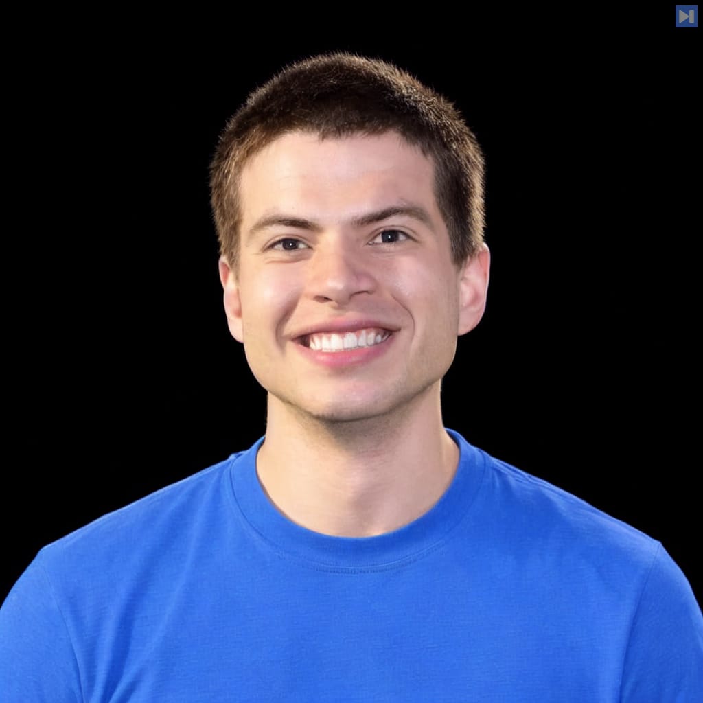 Head-and-shoulders portrait of Jeremy Ratcliff against a black background.
