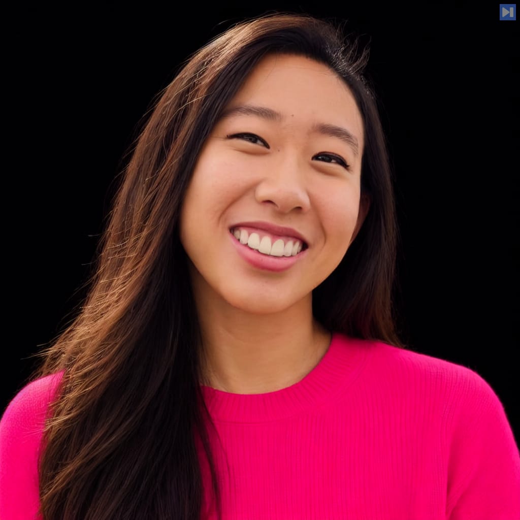 Head-and-shoulders portrait of Jess Wang against a black background.