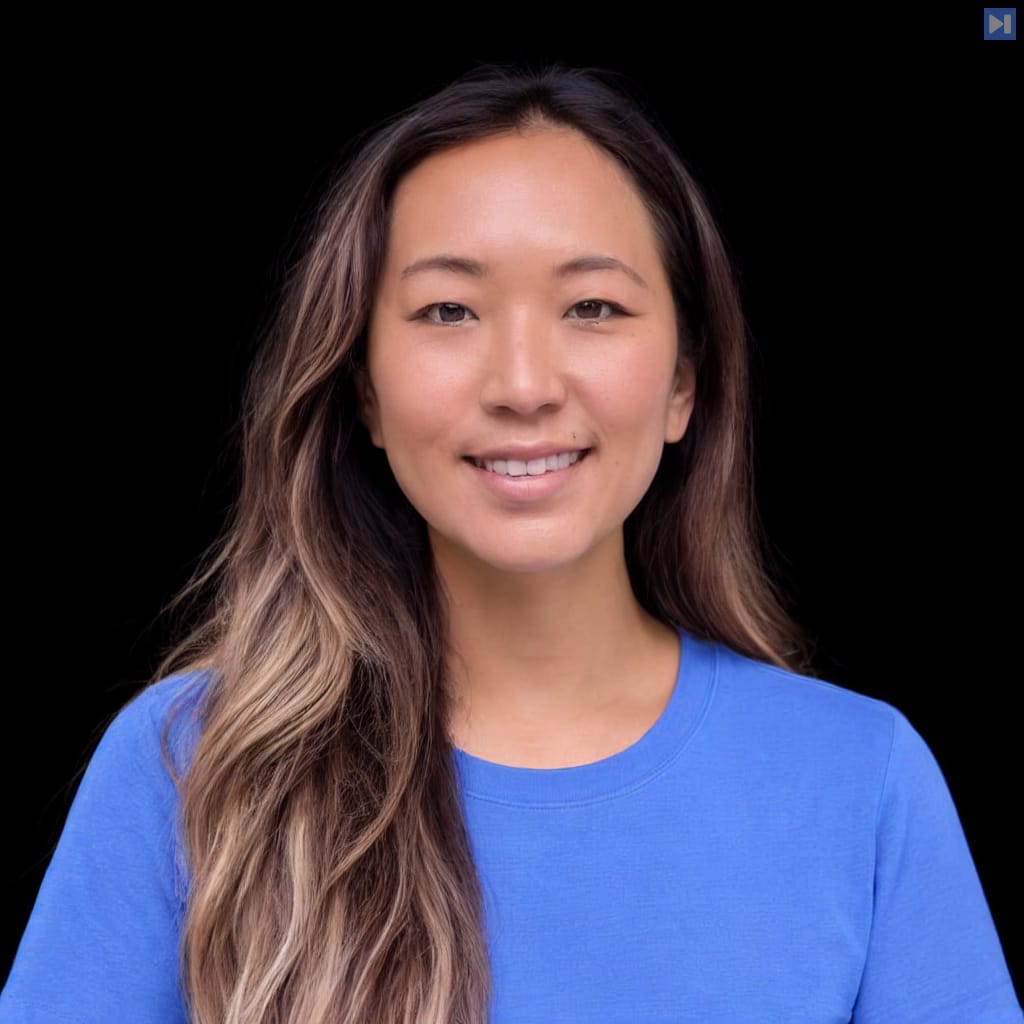 Head-and-shoulders portrait of Joanne Song against a black background.
