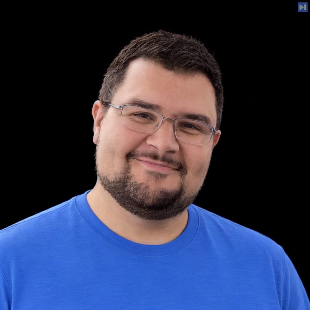 Head-and-shoulders portrait of Joe Pishgar against a black background.