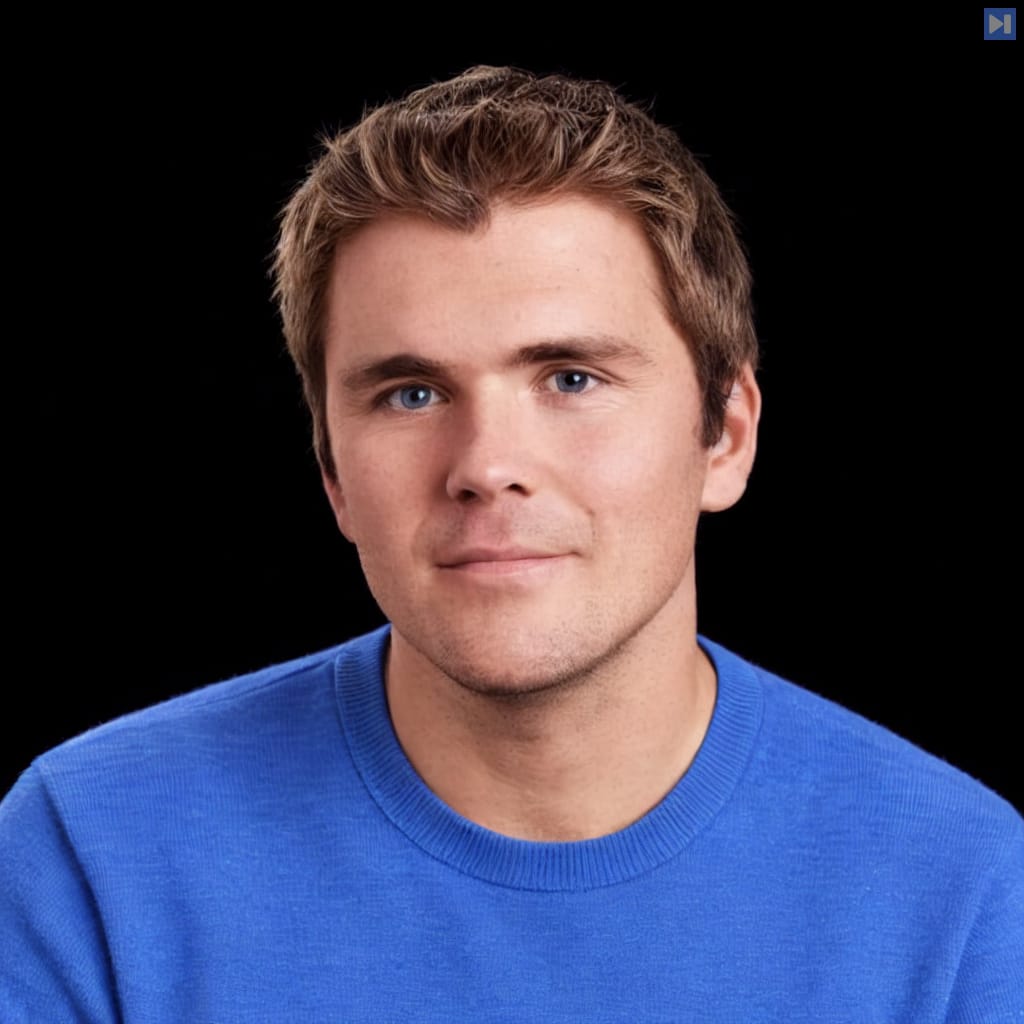 Head-and-shoulders portrait of John Collison against a black background.
