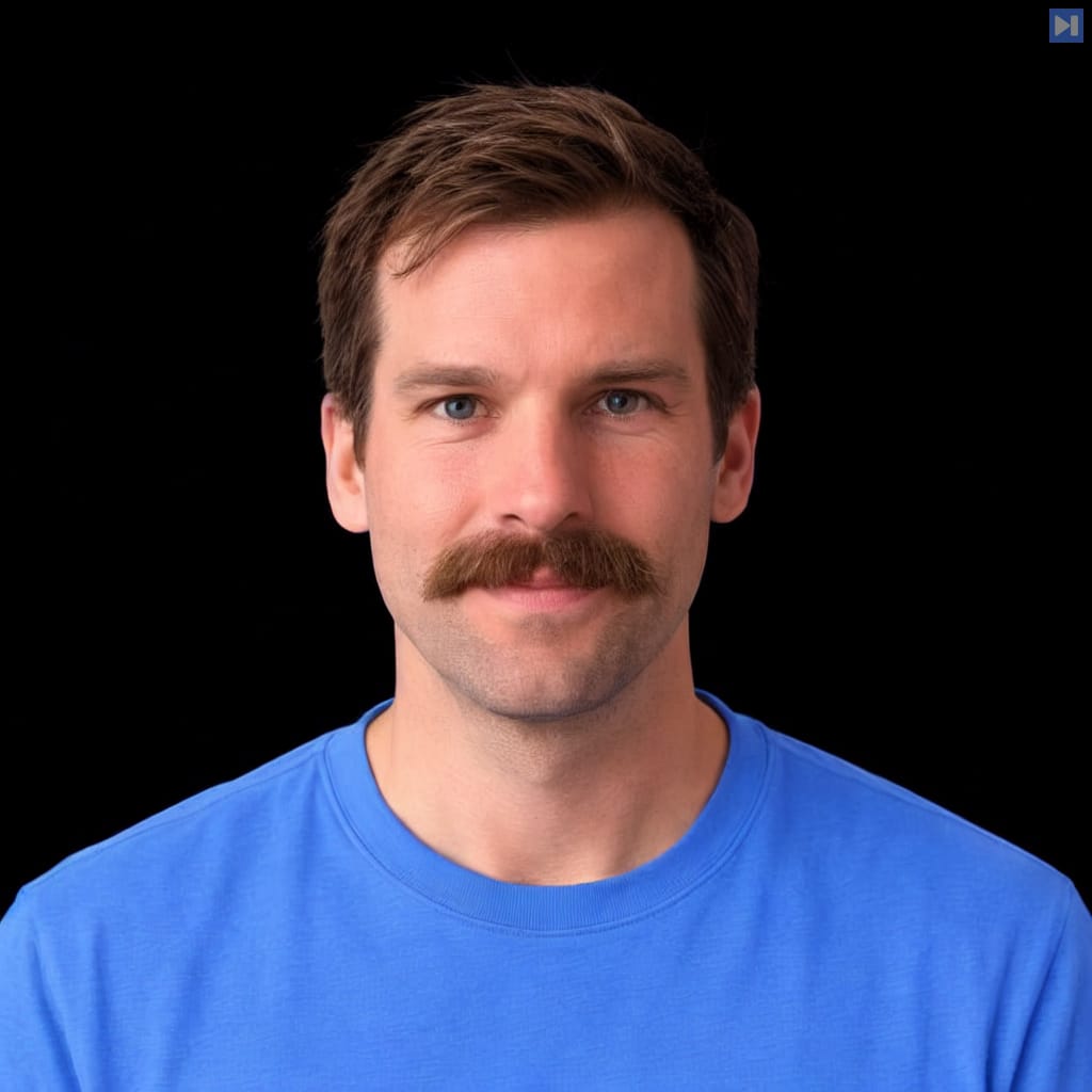 Head-and-shoulders portrait of Josh Lehman against a black background.