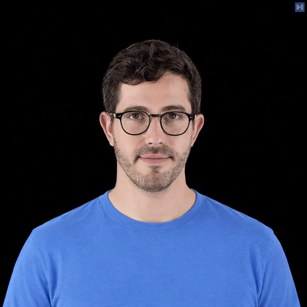 Head-and-shoulders portrait of Josh Zoffer against a black background.