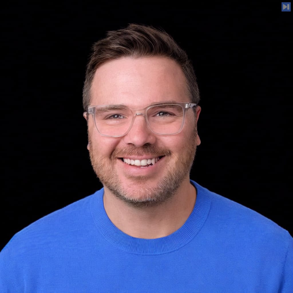 Head-and-shoulders portrait of Kevin Roose against a black background.
