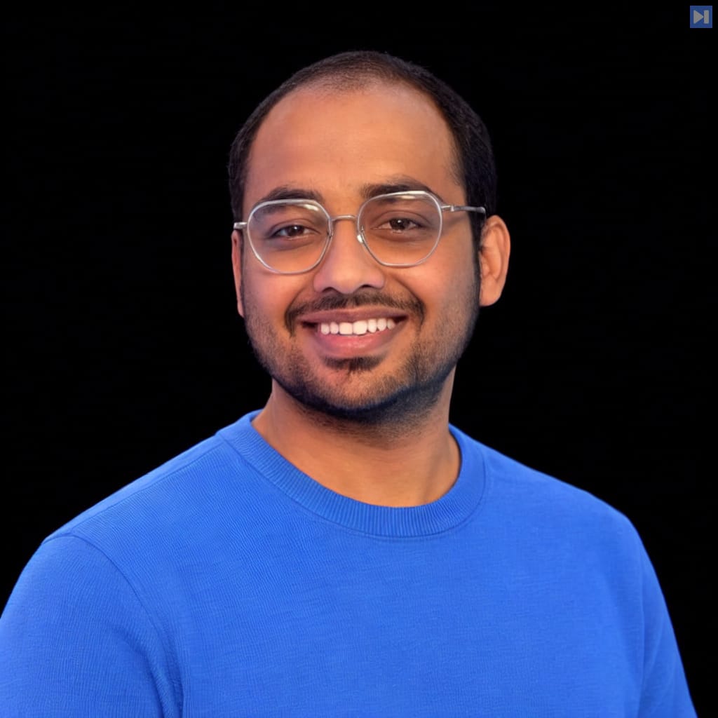 Head-and-shoulders portrait of Lakshya A Agrawal against a black background.