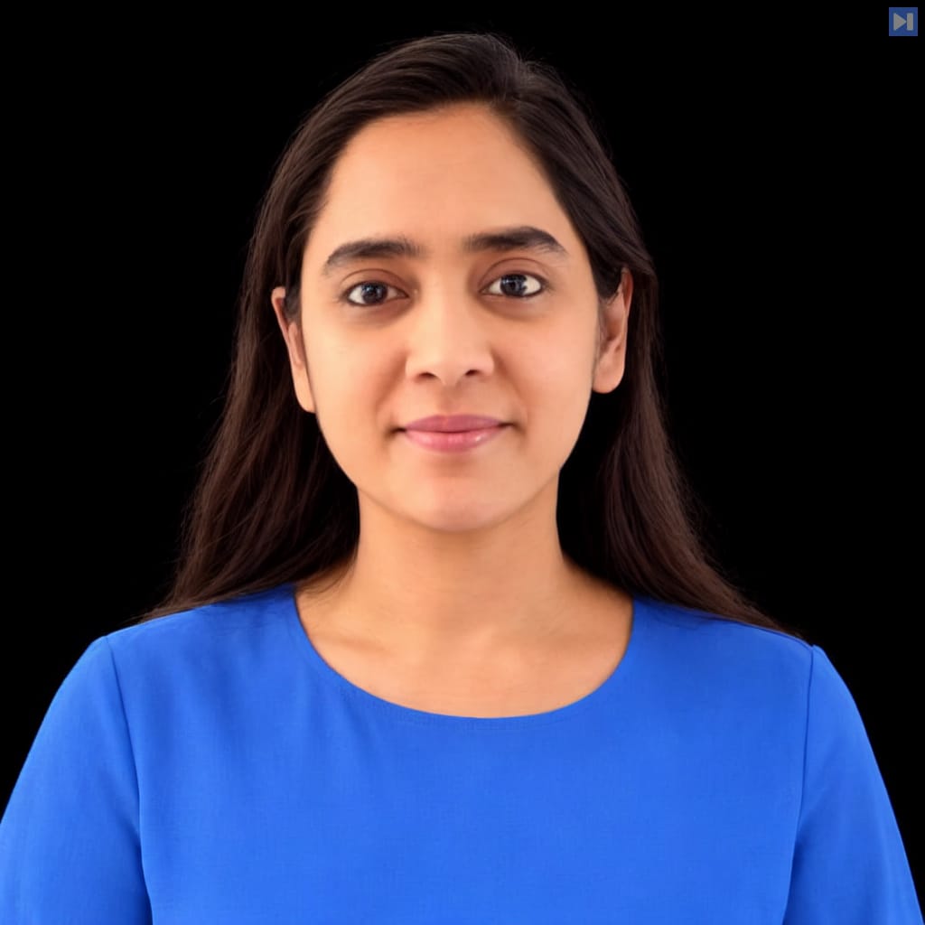 Head-and-shoulders portrait of Lovina Dmello against a black background.