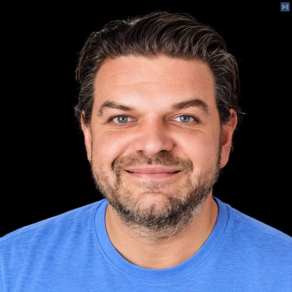 Head-and-shoulders portrait of Mario Zechner against a black background.