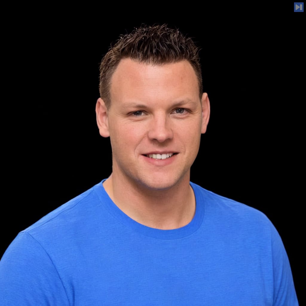 Head-and-shoulders portrait of Matt Gibiec against a black background.