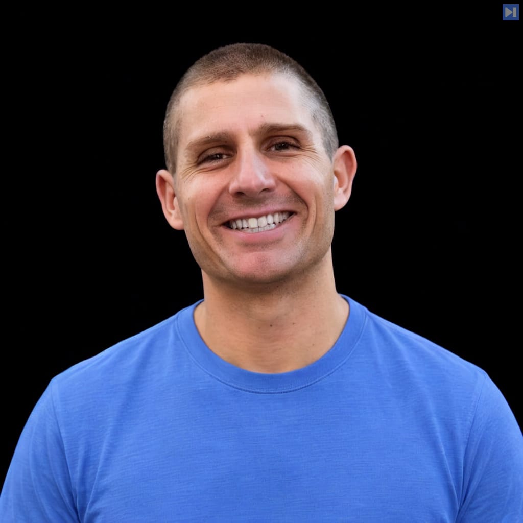 Head-and-shoulders portrait of Matt Palmer against a black background.