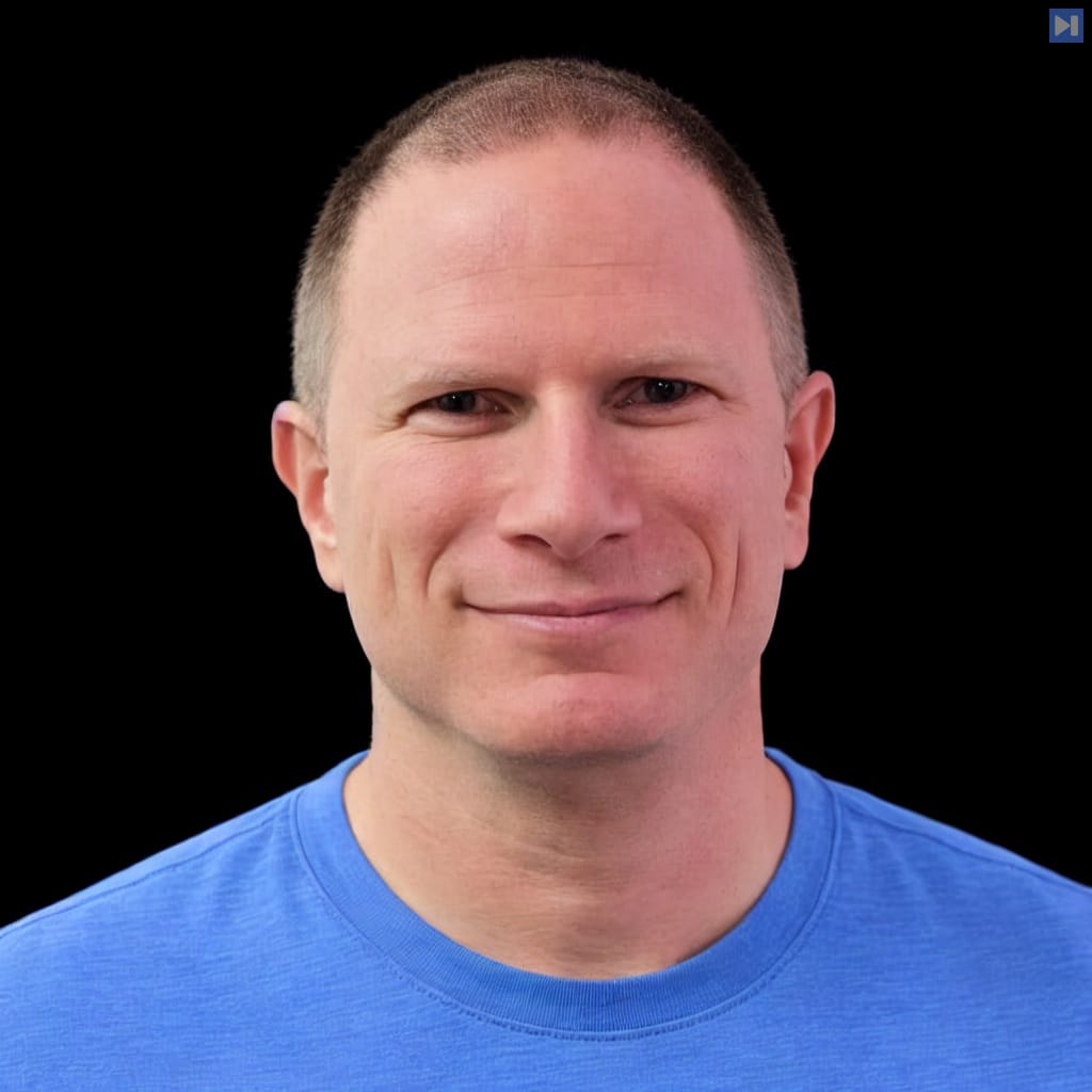 Head-and-shoulders portrait of Micah Silverman against a black background.