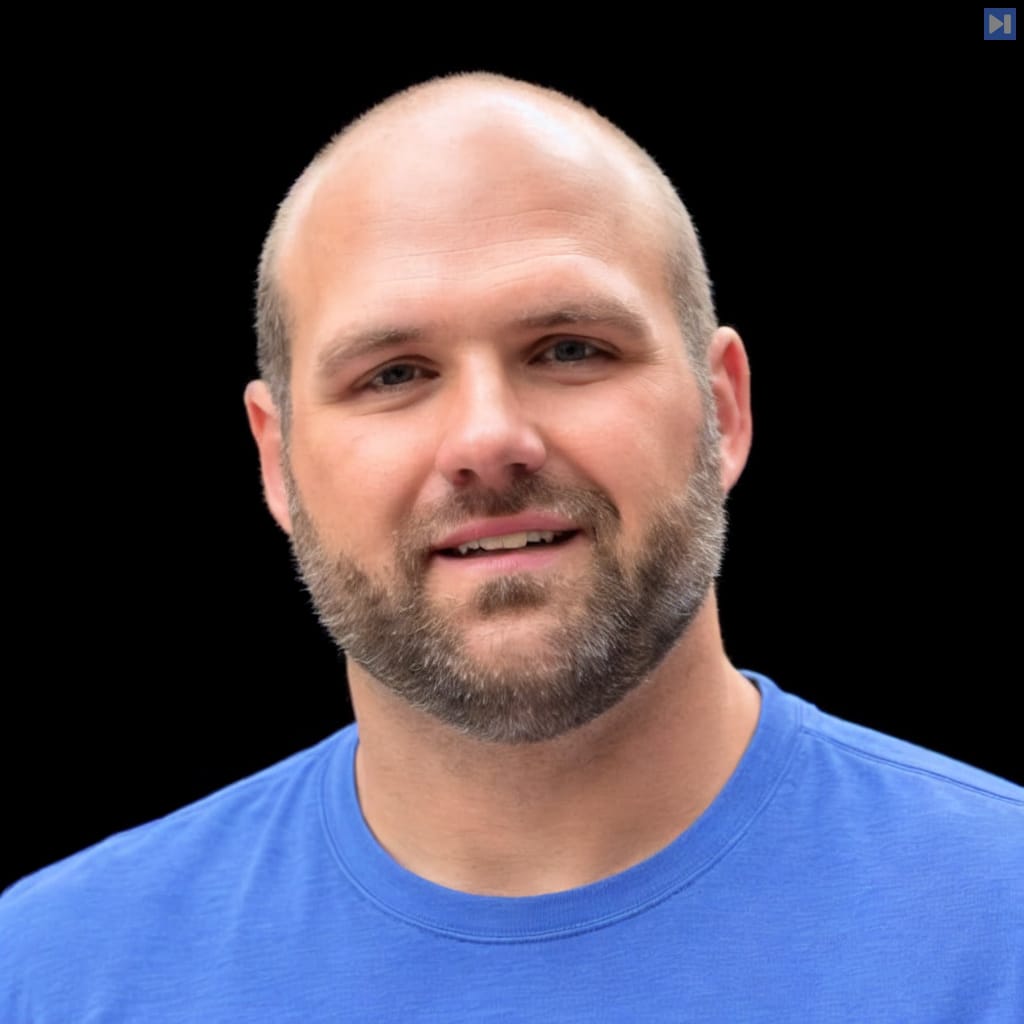 Head-and-shoulders portrait of Michael Davis against a black background.