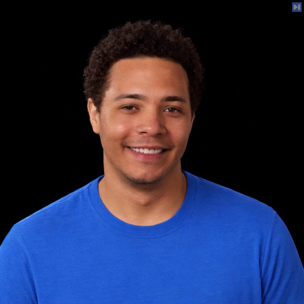 Head-and-shoulders portrait of Michael Patterson against a black background.